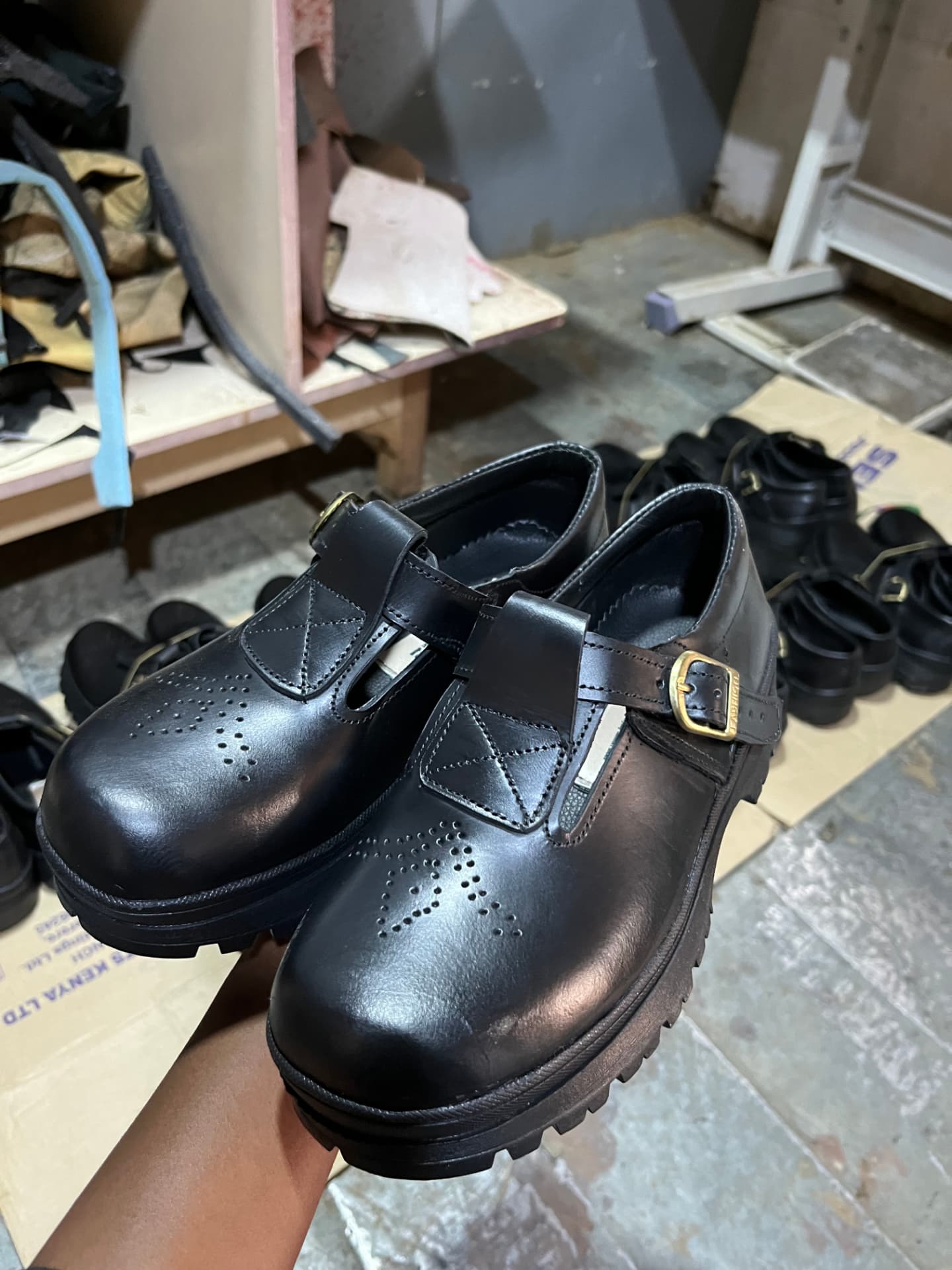 Hand-crafted Fiti Soles leather school shoes in the workshop